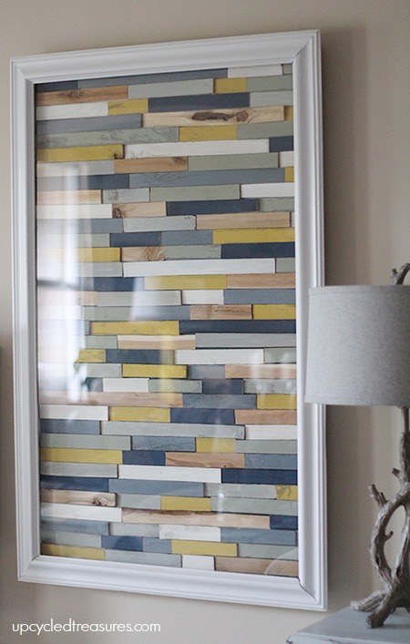 Love this idea! Paint wood shims different colors and then glue them down to create an interesting piece of wood shim artwork! upcycledtreasures.com