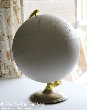 Looking for an outside the box idea? Look no further, check out this DIY Painted Globe for home or wedding decor. MountainModernLife.com