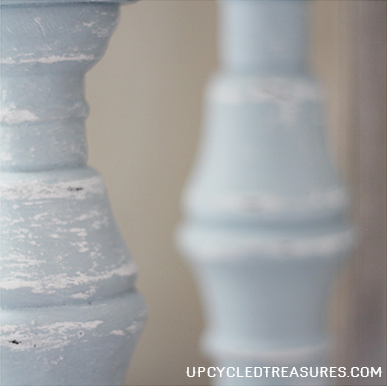 DIY Distressed Pillar Candle Holders! Check out how to create distressed pillar candle holders from some wood candle holders! UpcycledTreasures.com