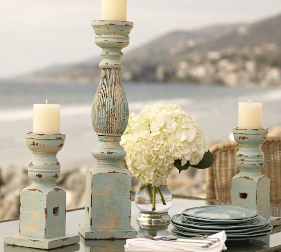 DIY Distressed Pillar Candle Holders! Check out how to create distressed pillar candle holders from some wood candle holders! UpcycledTreasures.com