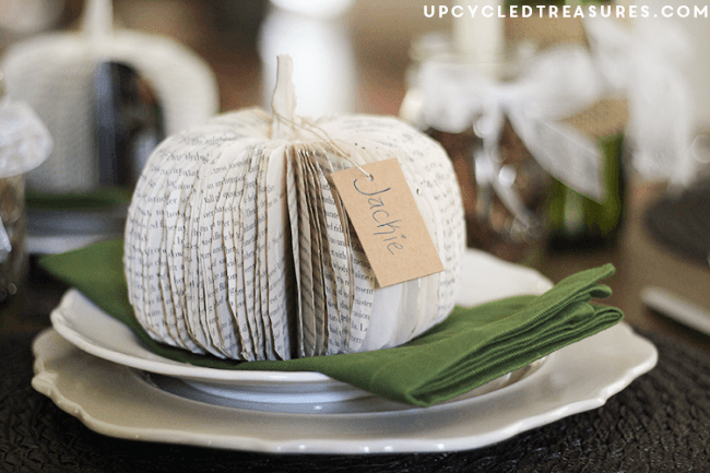 How to make DIY paper book pumpkins for a creative table place setting or to use as Halloween or Thanksgiving decor.