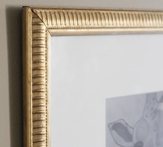 gold rubnbuff frame with giraffe print mounatinmodernlife.com