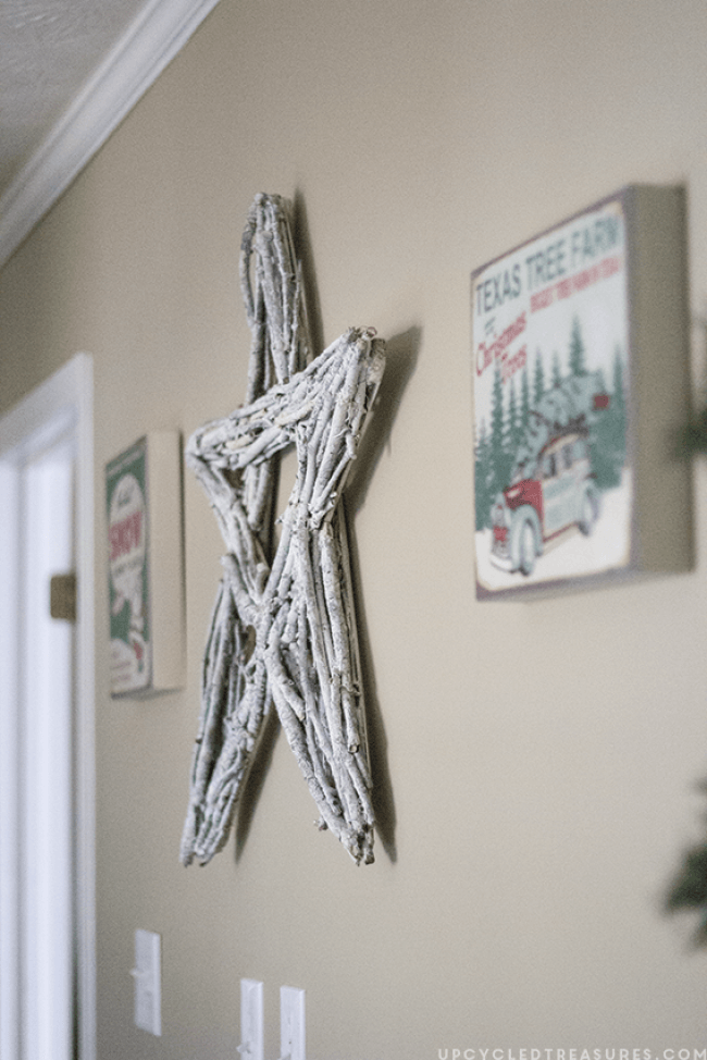 See how easy it was to make this Christmas Twig Star Wreath. The perfect rustic touch to your holiday decor. MountainModernLife.com