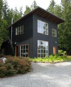 Looking for exterior home inspiration? Check out these 15 Modern Rustic Homes with Black Exteriors! MountainModernLife.com
