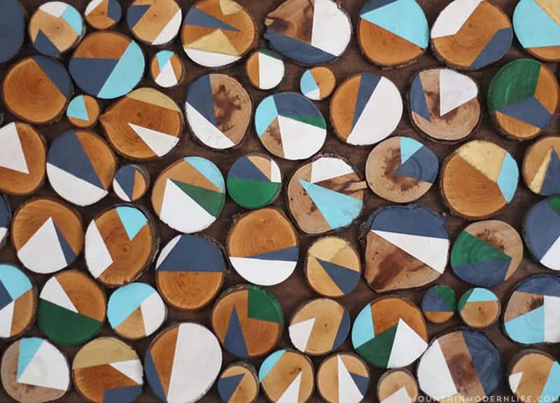 Looking for creative, affordable wall art ideas? See how easy it is to reimagine fallen branches into wood slice art! MountainModernLife.com