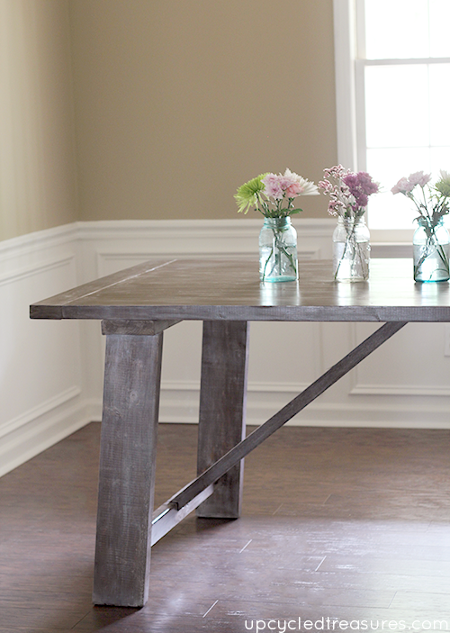 Do you want a beautiful dining table, but the price tag is a bit high? See how you can make your own West Elm Inspired Dining Table! MountainModernLife.com