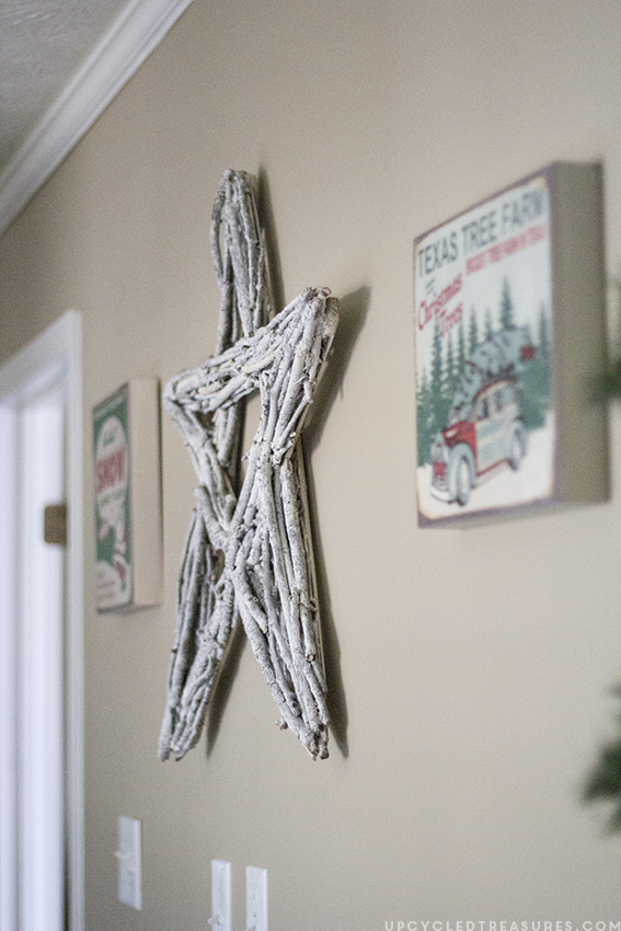 diy-twig-star-and-vintage-style-prints-on-wall-rustic-christmas-home-tour-upcycledtreasures