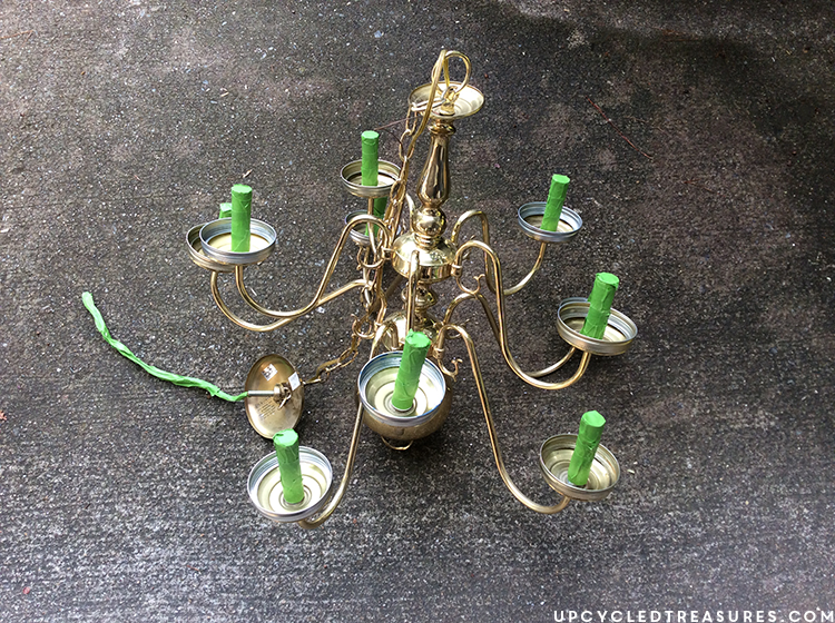 See how easy it is to create a vintage-inspired chandelier from a thrifted light fixture using spray paint and acrylic crystals! mountainmodernlife.com