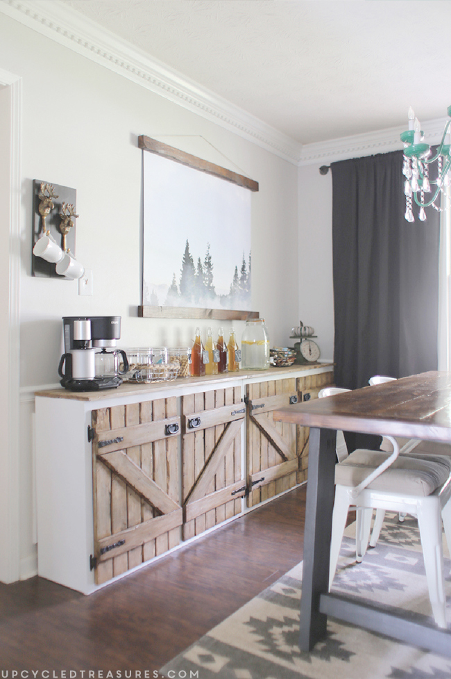 How to upcycle trash into treasure! See how a thrown out cabinet is transformed into an upcycled barnwood style sideboard. MountainModernLife.com