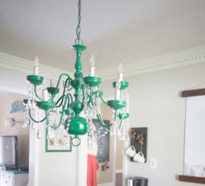 Emerald upcycled chandelier in rustic modern dining room mountainmodernlife.com