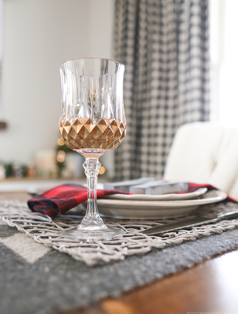 See how easy it is to create these DIY gilded glasses using stemware you may already have on hand and some liquid leaf! MountainModernLife.com