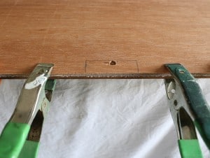 Cutting holes for wires in RV Ceiling Panel. MountainModernLife.com
