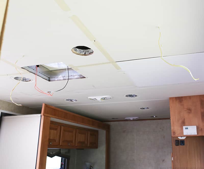 Dealing with a water leak in the ceiling of your motorhome? Come see how we replaced the ceiling panel in our RV. MountainModernLife.com