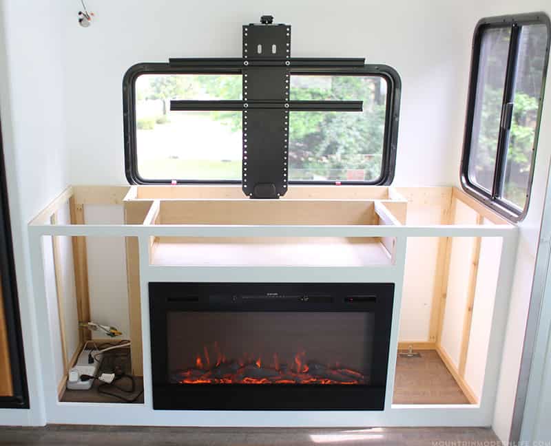 tv lift and fireplace in RV
