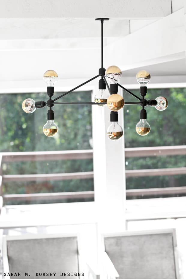 Thinking about making your own light fixture? You've gotta check out these DIY Modern Light Fixtures you won't believe are handmade! Photo: DIY Light Fixture from Sarah M Dorsey Designs