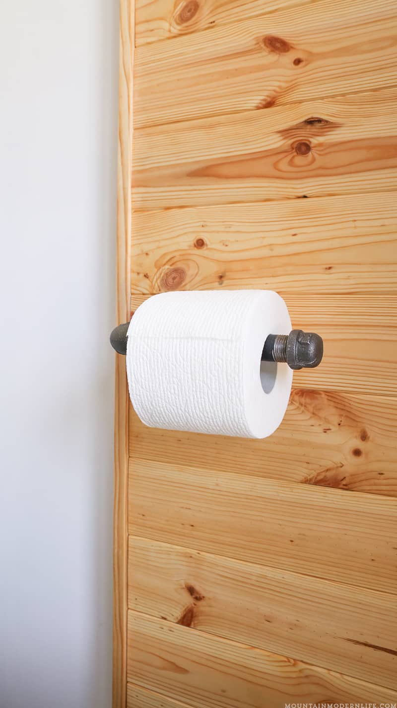 Looking to add character to your bathroom? See how you can make this rustic toilet paper holder in less than 5 minutes! MountainModernLife.com
