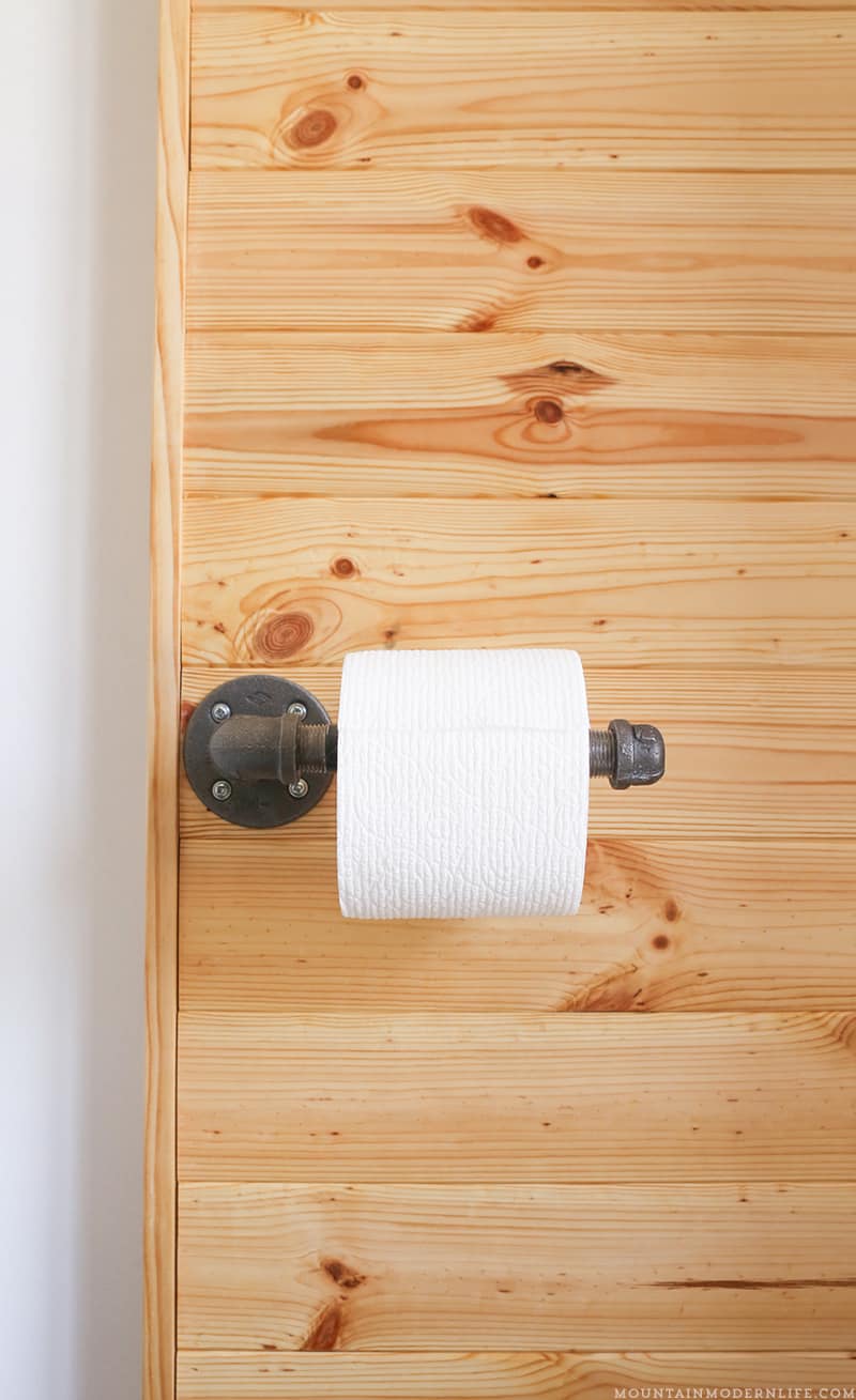 Looking to add character to your bathroom? See how you can make this rustic toilet paper holder in less than 5 minutes! MountainModernLife.com