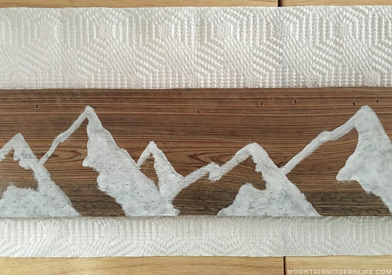 See how easy it is to create this mountain wall art using reclaimed wood. | MountainModernLife.com