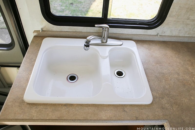 See how easy it is to remove your RV Kitchen Sink, in case you need to set it aside, clean it or replace it. MountainModernLife.com