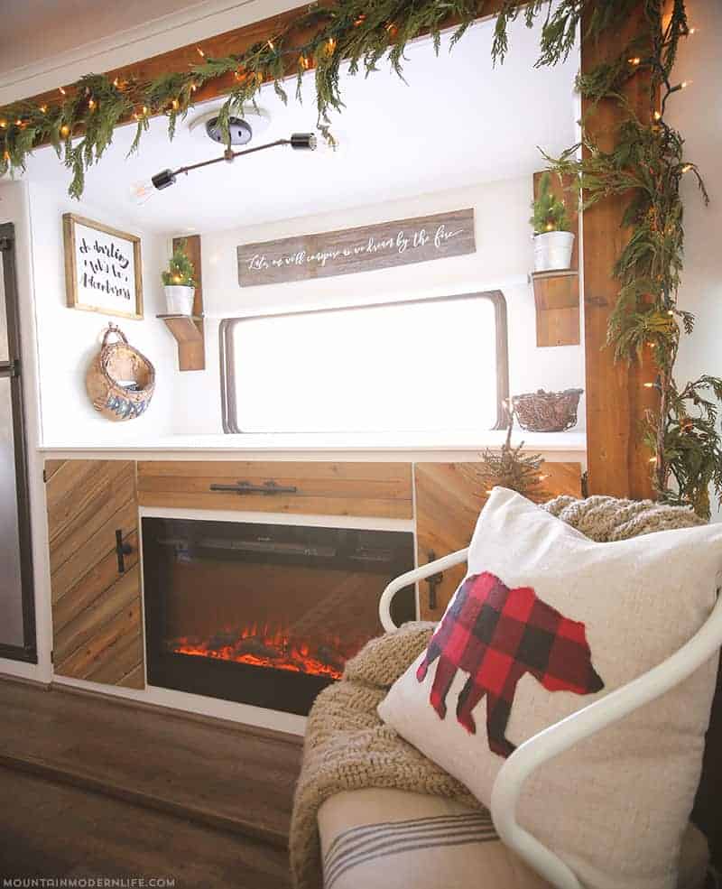 Are you looking for a creative way to hide your tv when it's not in use? We dive into how we hid our tv and added a cozy vibe with our electric fireplace.