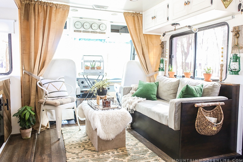 Could you live in 200 square feet? See how this outdated motorhome was completely transformed into a rustic modern RV! MountainModernLife.com