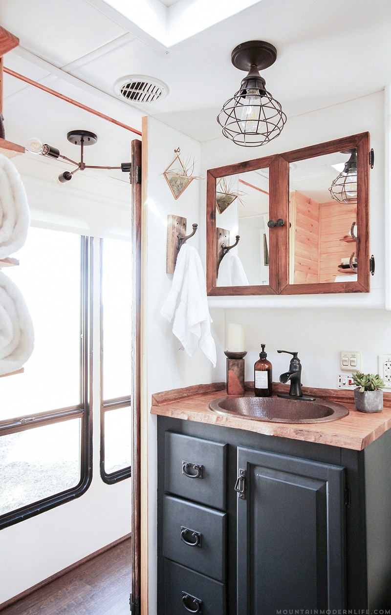 Could you live in less than 300 square feet? See how this outdated motorhome was completely transformed into a rustic modern RV! MountainModernLife.com
