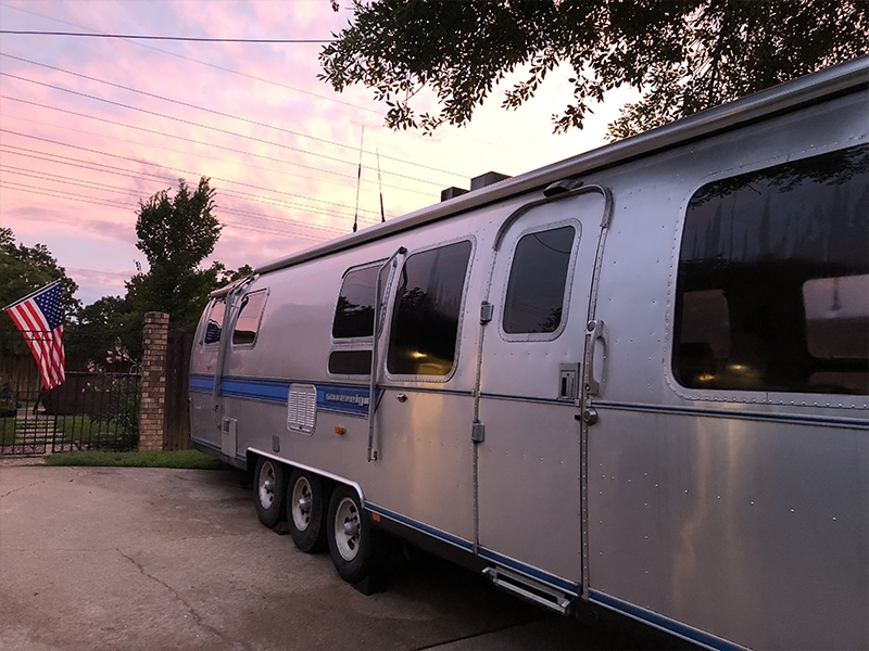 Tour this Renovated Airstream from Trailer Trashin with Modern Finishes and Tropical Vibes! Featured on MountainModernLife.com