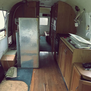 Tour this Renovated Airstream from Trailer Trashin' with Modern Finishes and Tropical Vibes! Featured on MountainModernLife.com