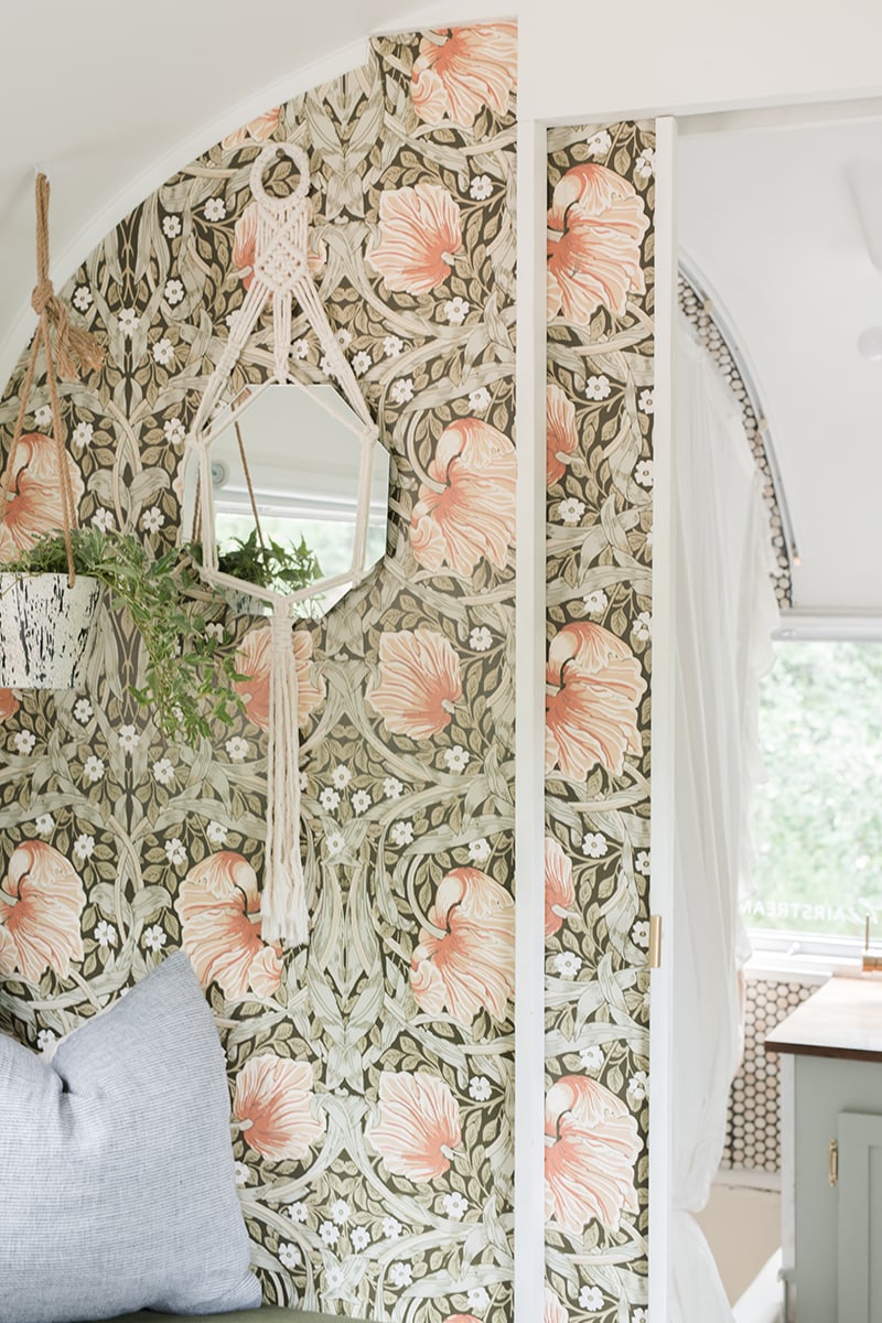 Tour this romantic Airstream that has been reimagined by an artist and textile designer, Bonnie Christine! #Airstream #camperremodel #tinyhometour