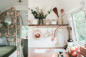 Tour this romantic Airstream that has been reimagined by an artist and textile designer, Bonnie Christine! #Airstream #camperremodel #tinyhometour