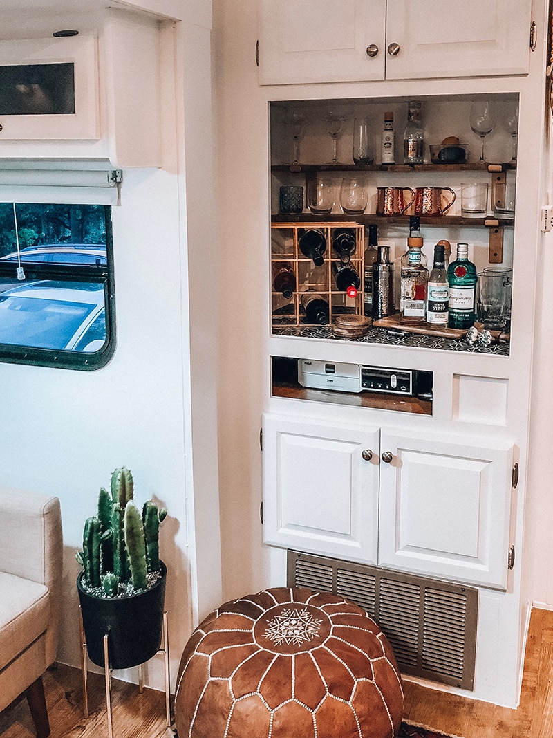 See how a passion for international travel influenced the interior design of this camper renovation! / Photos by @ems_traveldiary / Featured on MountainModernLife.com #camperrenovation
