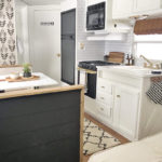 Tour this budget-friendly farmhouse camper that was transformed for $500 by Proverbs31Girl! Featured on MountainModernLife.com