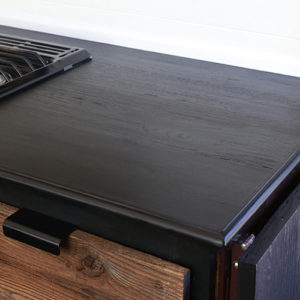 Considering adding black kitchen countertops to your home? Come see how we updated butcher block countertops for a rustic modern vibe in our RV. MountainModernLife.com