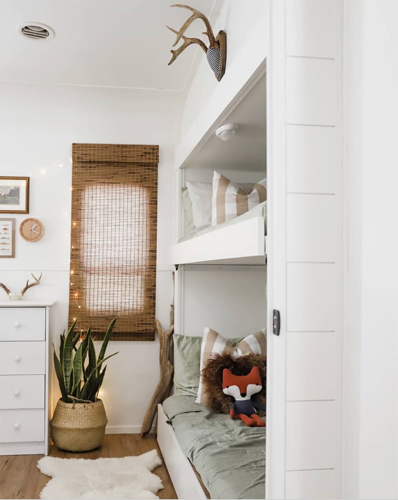 Tour this modern RV renovation with old world charm from @r.maria.fuller that has wood beams that will make you swoon! See the before and after on MountainModernLife.com