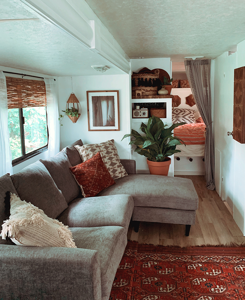 The muted earth tones in this eclectic camper will have you dreaming of the desert | Featuring @madefreeco on MountainModernLife.com