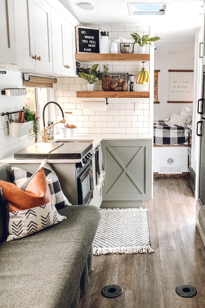 You’ll wanna go glamping in this Modern Farmhouse Style Toy Hauler! Featuring @FoxandTimber on MountainModernLife.com