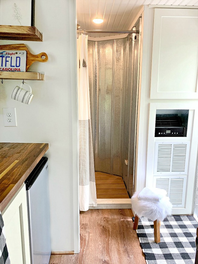 This may be the most stylish cargo trailer conversion you’ve ever seen! Come see how @ChatfieldCourt transformed an empty shell into a modern tiny home on wheels! Featured on MountainModernLife.com