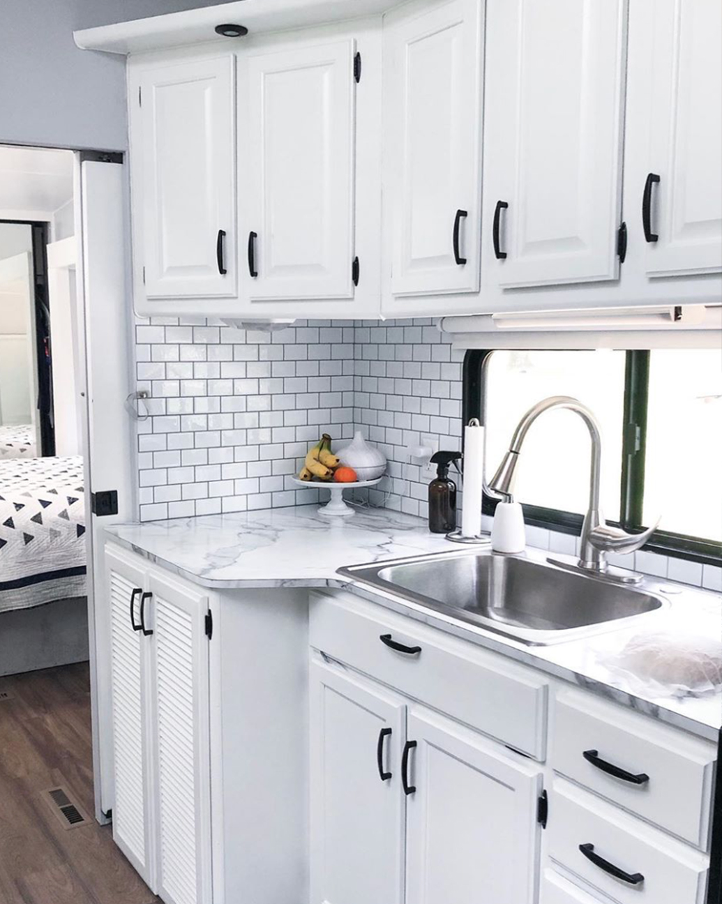 See how a white and gray interior transformed this remodeled 5th wheel!