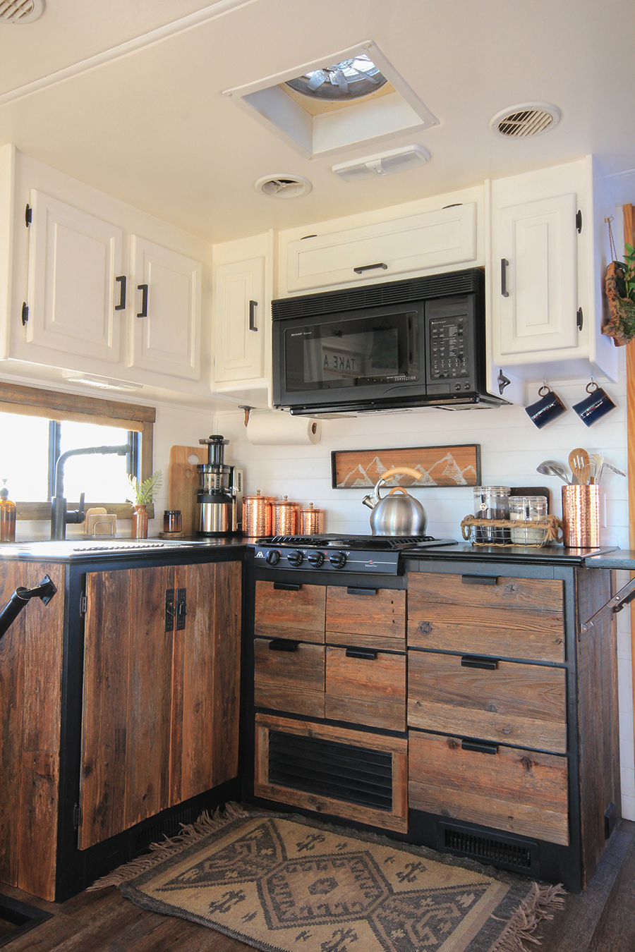 Reclaimed Wood Kitchen Cabinets inside RV | MountainModernLife.com