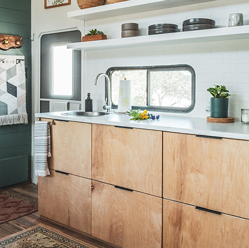 Peek inside this family-friendly Toy Hauler remodel with an earthy, modern interior