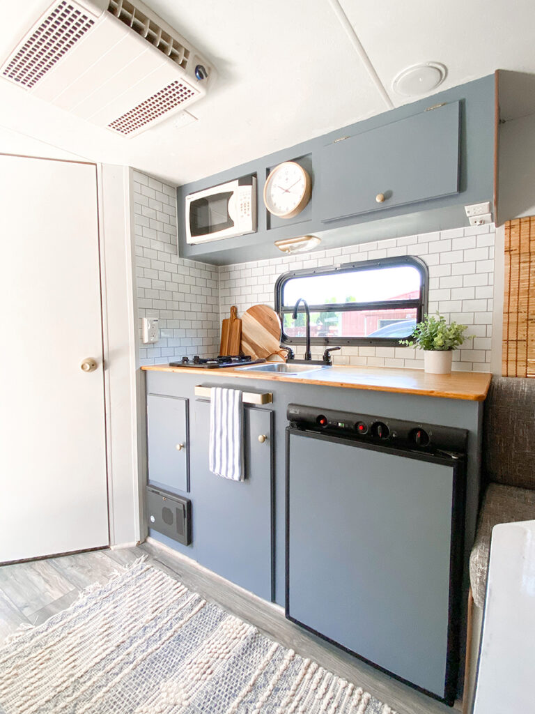 An accountant with a passion for DIY renovated this small camper for ...