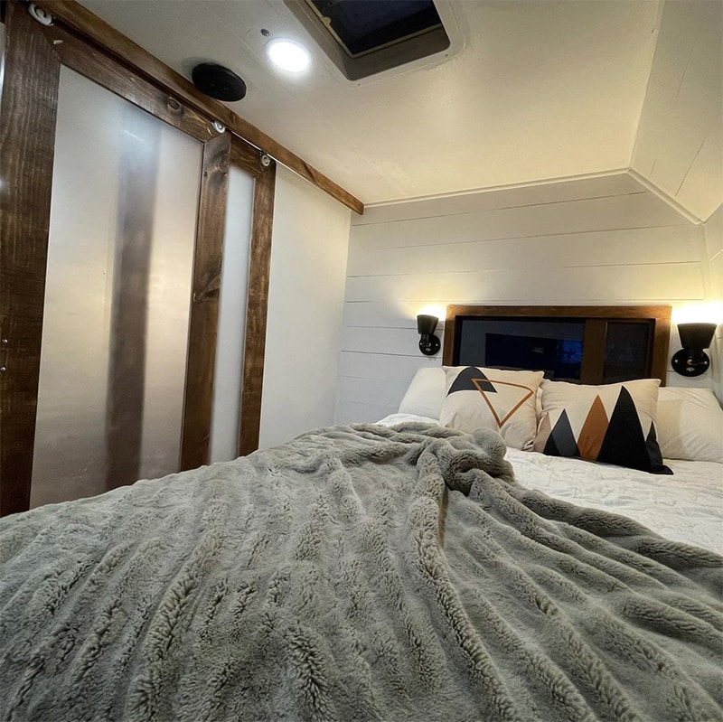 camper bedroom remodel with sliding doors