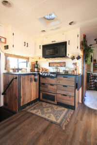 RV kitchen with reclaimed cabinets