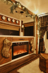 motorhome fireplace decorated for Christmas as night