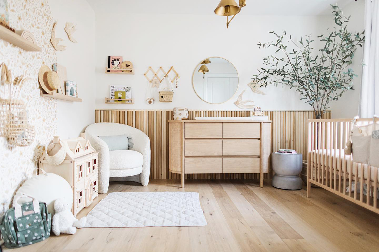 neutral nursery with fluted accent wall