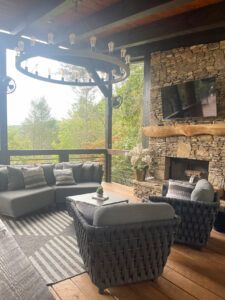 mountain home outdoor space with fireplace