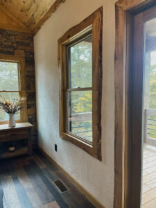 live edge wood frame around window in mountain home