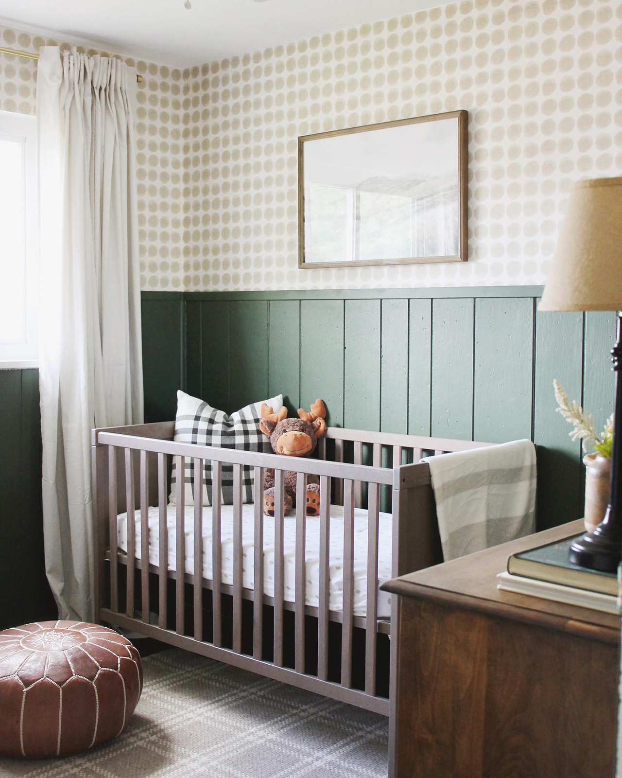 nursery with green accent wall