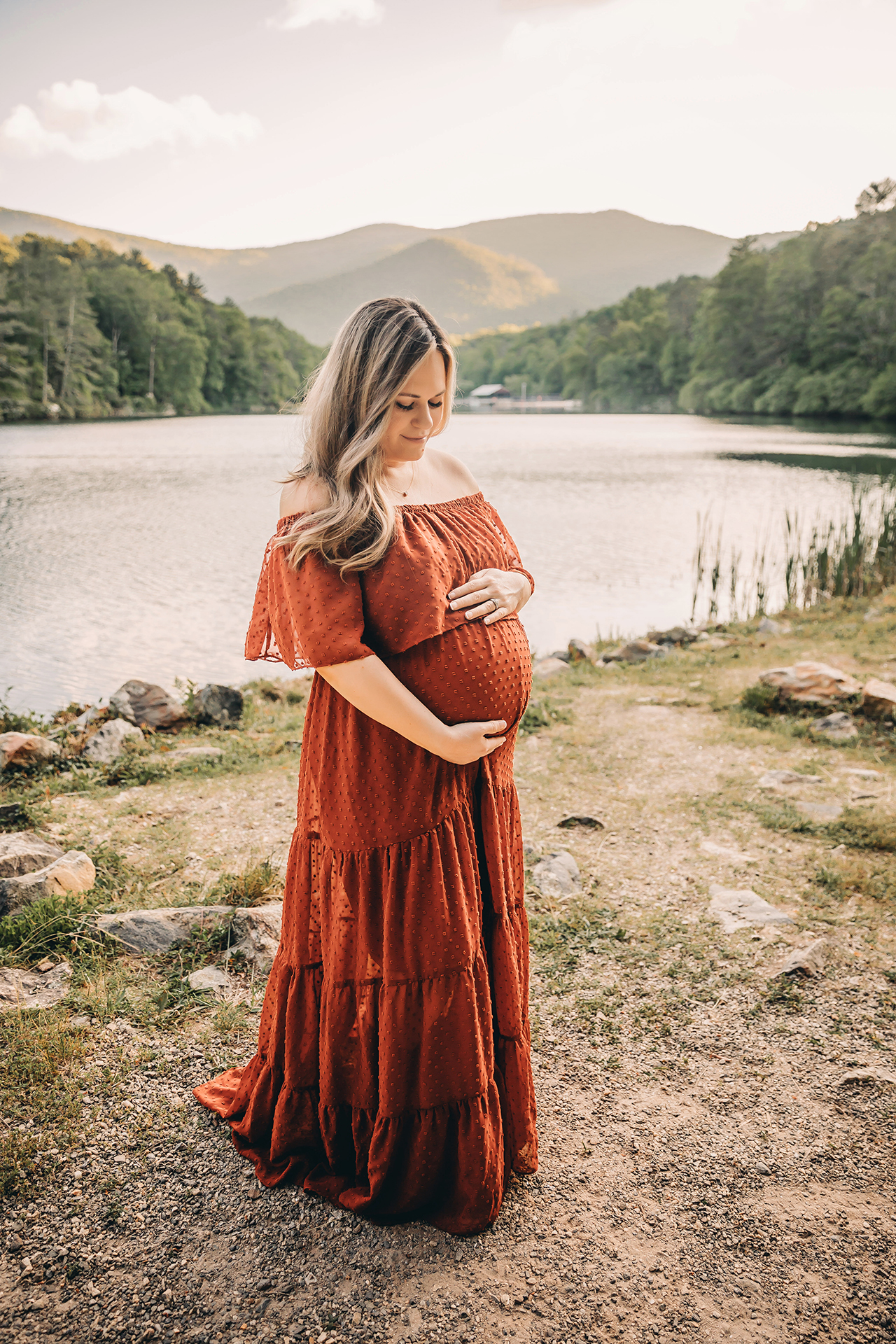 rust colored dress for maternity photo shoot