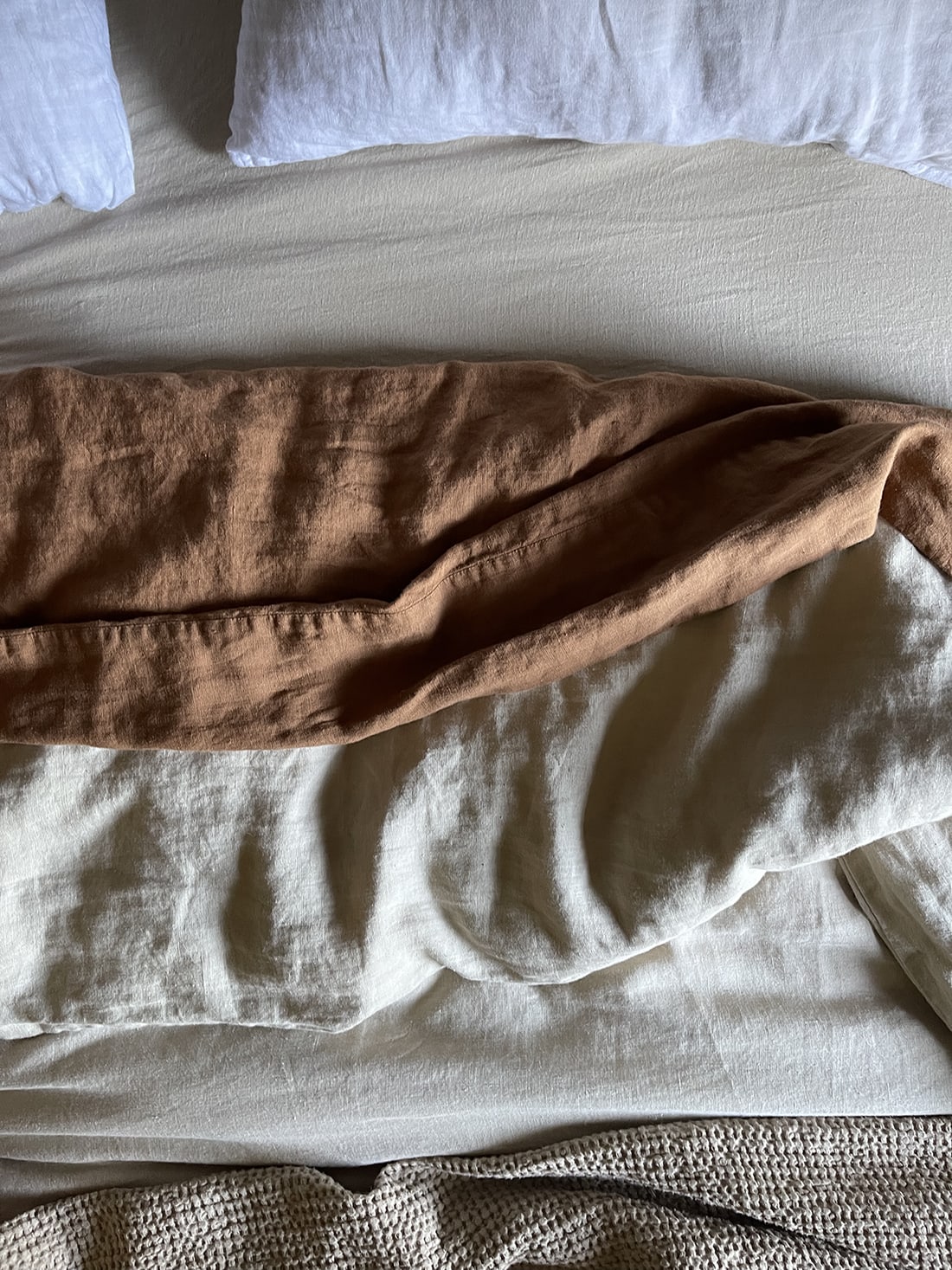 layers of cozy natural and cinnamon linen